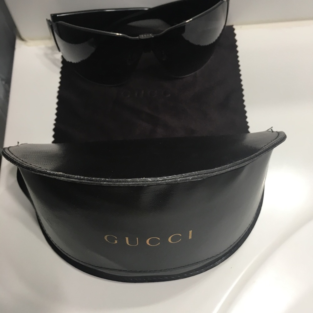 Authentic Gucci Sunglasses with case.